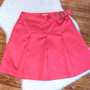 Izod XPG Athletic Golf Skort, pleated, in silky hot coral pink